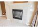 Close-up of a tile-surround fireplace in the spacious living area at 4208 Lower Saxon Ave, North Las Vegas, NV 89085
