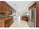 Well-equipped kitchen with stainless steel appliances and beautiful granite countertops at 4208 Lower Saxon Ave, North Las Vegas, NV 89085