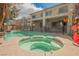 Backyard pool and spa with a safety fence, perfect for outdoor enjoyment at 4208 Lower Saxon Ave, North Las Vegas, NV 89085