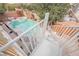 Aerial view of a private backyard swimming pool, raised jacuzzi, and patio area with landscaping at 4208 Lower Saxon Ave, North Las Vegas, NV 89085
