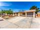 Well-maintained single-story home with solar panels, spacious driveway, and an attached garage at 4360 Wendy Ln, Las Vegas, NV 89115