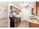 Functional kitchen featuring stainless steel appliances and wood-tone cabinets at 4360 Wendy Ln, Las Vegas, NV 89115