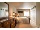 Bedroom with a dresser and closet doors at 4411 Alexis Dr # 444, Las Vegas, NV 89103