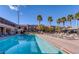 Community Pool featuring plenty of seating and mature landscaping at 4411 Alexis Dr # 444, Las Vegas, NV 89103