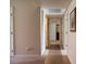 Hallway showing access to different rooms in the house with carpet flooring at 4411 Alexis Dr # 444, Las Vegas, NV 89103
