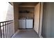 Outdoor laundry room features a full sized washer and dryer at 4411 Alexis Dr # 444, Las Vegas, NV 89103