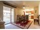 Cozy living room with dining area and a sliding glass door to the balcony at 4411 Alexis Dr # 444, Las Vegas, NV 89103