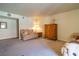 Well-lit living room featuring neutral-colored walls and carpet flooring at 4411 Alexis Dr # 444, Las Vegas, NV 89103