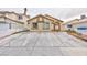 Single story home with desert landscaping and a spacious driveway at 5166 Silverheart Ave, Las Vegas, NV 89142