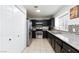 Modern kitchen featuring stainless steel appliances, granite counters, and tiled backsplash at 5166 Silverheart Ave, Las Vegas, NV 89142