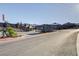 Community entrance with landscaping and gated entry at 5236 Sunstone Mesa Dr, Las Vegas, NV 89166