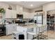 Well-equipped kitchen with granite countertops, stainless appliances, and ample cabinet space at 5236 Sunstone Mesa Dr, Las Vegas, NV 89166