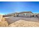 Spacious backyard featuring a covered patio and potential for a lush garden at 5846 Slate Rock Ct, Las Vegas, NV 89149