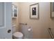 Accessible half-bath featuring a toilet with grab bars at 609 Viale Machiavelli Ln, Henderson, NV 89011