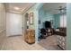 Inviting home entryway showcases tile flooring, an elegant cabinet, and seamless access to the living area at 609 Viale Machiavelli Ln, Henderson, NV 89011
