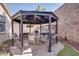 Gazebo with outdoor seating, a ceiling fan, and a bar at 609 Viale Machiavelli Ln, Henderson, NV 89011