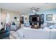 Spacious living room with an open layout, blending seamlessly into other living spaces for relaxation and socializing at 609 Viale Machiavelli Ln, Henderson, NV 89011