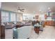 Open-concept living area blends the living room, dining space, and kitchen for easy entertaining at 609 Viale Machiavelli Ln, Henderson, NV 89011