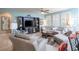 Comfortable living room boasts a large entertainment center, stylish furniture, and ample seating at 609 Viale Machiavelli Ln, Henderson, NV 89011
