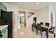 Dining area featuring tile floors, neutral walls, and an open layout at 6891 Nickel Mine Ave, Las Vegas, NV 89122