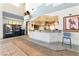 Clubhouse kitchenette with counter, sink, microwave and stainless steel refrigerator at 6891 Nickel Mine Ave, Las Vegas, NV 89122