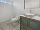 Stylish powder room features a sleek vanity, square sink, and neutral tiling at 7110 Brighton Village St, Las Vegas, NV 89166