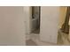 Neutral bathroom featuring tub, neutral paint, and access to laundry room at 7456 Oatman Ln, Las Vegas, NV 89120