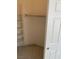 Bright closet with basic shelving and hardware for hanging garments at 7456 Oatman Ln, Las Vegas, NV 89120