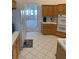 Bright kitchen with wood cabinets, white countertops, and stainless steel appliances at 7456 Oatman Ln, Las Vegas, NV 89120
