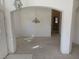 Bright and airy living room featuring neutral carpet, white walls, and transom windows at 7456 Oatman Ln, Las Vegas, NV 89120