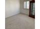 Neutral carpet and white walls create a spacious feel at 7456 Oatman Ln, Las Vegas, NV 89120