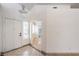 Bright foyer featuring tile flooring and a clear view into an adjacent room with natural light at 7613 Falconwing Ave, Las Vegas, NV 89131