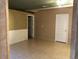 Inviting living room with tiled floor, neutral walls, and ample natural light perfect for entertaining at 7613 Falconwing Ave, Las Vegas, NV 89131