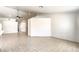 Expansive living area with tile flooring, high ceilings, unique accent walls and an open layout for versatile use at 7613 Falconwing Ave, Las Vegas, NV 89131