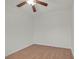 Simple bedroom with wood floors, a ceiling fan and neutral paint at 780 Flowing Meadow Dr, Henderson, NV 89014