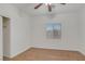 Bedroom includes plank flooring, ceiling fan, window and a closet for storage at 780 Flowing Meadow Dr, Henderson, NV 89014