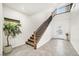 Light and bright entryway with tile flooring and a staircase leading upstairs at 780 Flowing Meadow Dr, Henderson, NV 89014