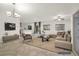 Open floor plan with tile floors, modern furniture, and natural light at 780 Flowing Meadow Dr, Henderson, NV 89014