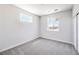 Cozy bedroom with gray carpet and a bright window that allows ample natural light at 8629 Ensworth St # 111, Las Vegas, NV 89123
