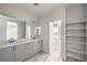 Bright bathroom featuring a double sink vanity and ample storage at 8629 Ensworth St # 112, Las Vegas, NV 89123