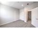 Comfortable bedroom with closet, carpet, and doorway at 8629 Ensworth St # 112, Las Vegas, NV 89123