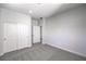 Spacious bedroom with carpet, closet, and an open doorway at 8629 Ensworth St # 112, Las Vegas, NV 89123