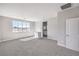 Spacious main bedroom features carpet flooring and bright windows at 8629 Ensworth St # 112, Las Vegas, NV 89123