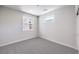 Bedroom with neutral carpet, natural light, and white trim at 8629 Ensworth St # 112, Las Vegas, NV 89123