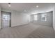 Expansive upstairs bonus room offers recessed lighting, and neutral carpet creating a bright area at 8629 Ensworth St # 112, Las Vegas, NV 89123
