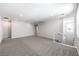 Large bonus room with ample carpet space, natural light, and modern design at 8629 Ensworth St # 112, Las Vegas, NV 89123