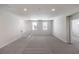 Upstairs bonus room with neutral carpet, ample lighting, and a comfortable, inviting space at 8629 Ensworth St # 112, Las Vegas, NV 89123