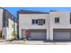 Modern two-story home boasts a neutral palette and sleek design with a two-car garage at 8629 Ensworth St # 112, Las Vegas, NV 89123