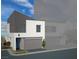 Contemporary home with modern architecture featuring a gray garage door and minimalist landscaping at 8629 Ensworth St # 112, Las Vegas, NV 89123