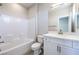 Cozy bathroom featuring a tub/shower combo, toilet, and single vanity with a mirror at 8629 Ensworth St # 113, Las Vegas, NV 89123
